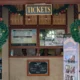 Loket tiket Desa Wisata Penglipuran Bali dengan papan harga resmi dan jam operasional